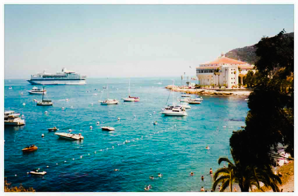 A large body of water with many boats in it